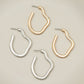 Irregular shape metal hoop earrings