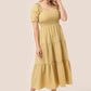 Tiered long dress with puff sleeves