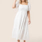 Tiered long dress with puff sleeves